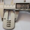 Пластина для регулювання натягу пиляльного ланцюга